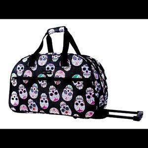 Betsey Johnson carry on luggage